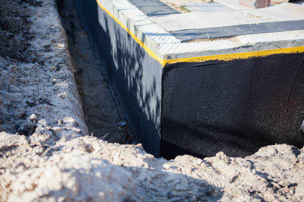 Professional Waterproofing technician working in Little Suamico, WI